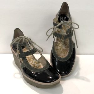 Fly London wedge black patent with olive green trim shoes. EU 38 -  US 7.5/8